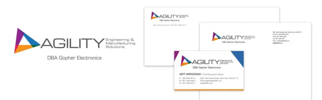 a close-up of several business cards - rebranding