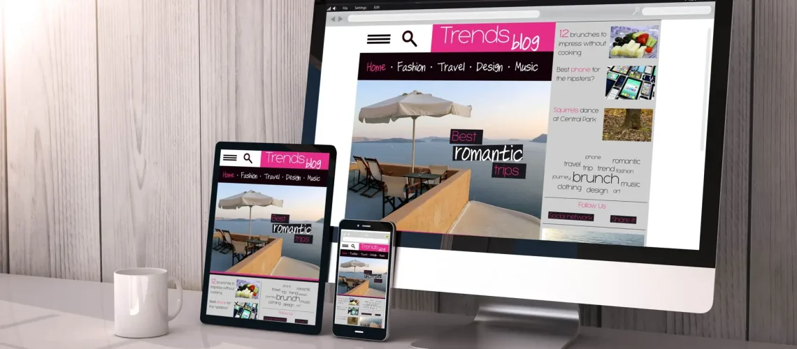 a computer and a phone on a table